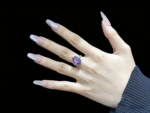Model wearing Amethyst ring on finger, showcasing mystical elegance and intellectual charm.