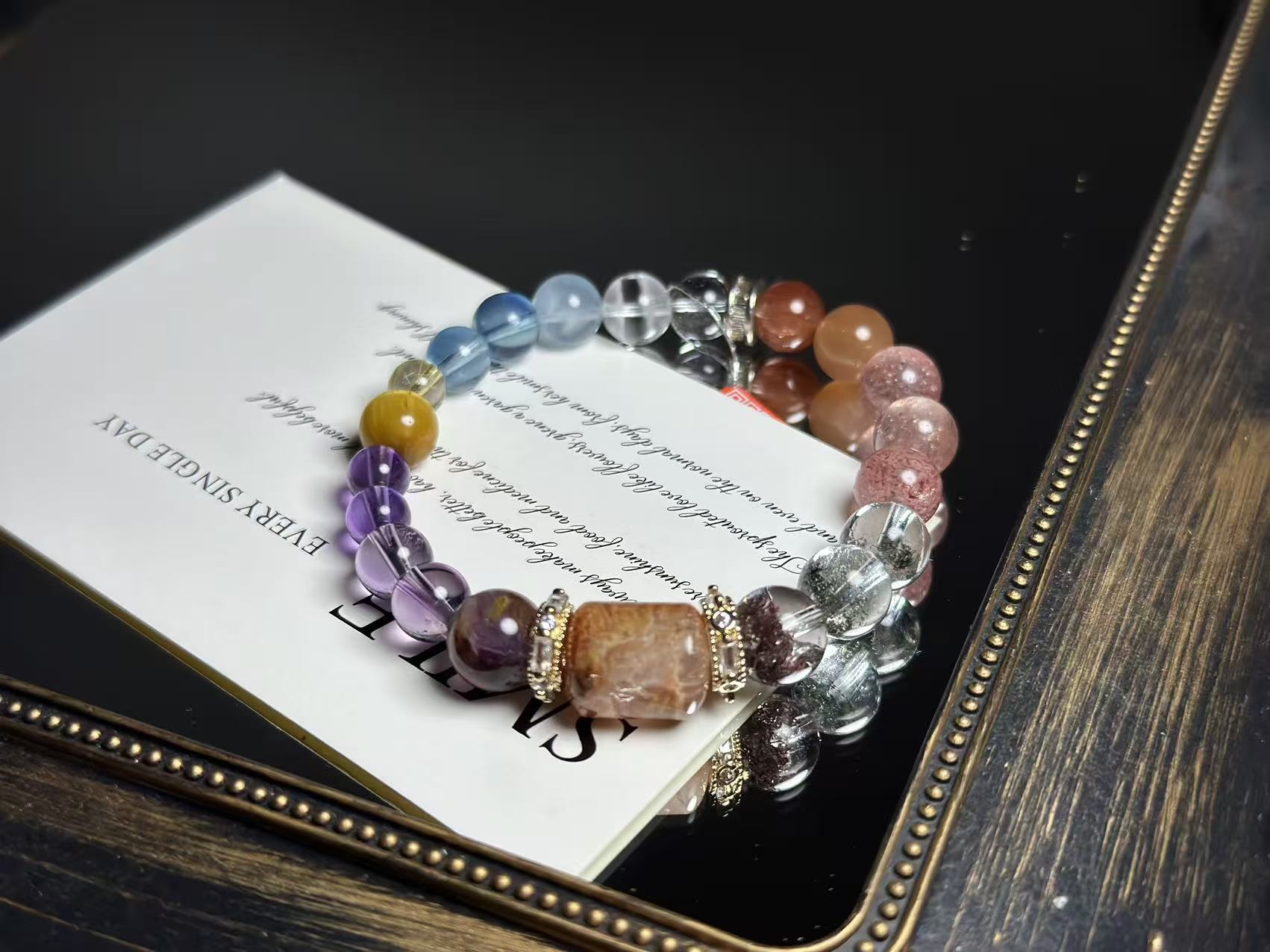 Core Energy Crystals Focus - The Driving Force Behind the Five Elements Close-up of the bracelet's core crystals, featuring Gold Rutilated Quartz, Green Phantom Quartz, Amethyst, and others.