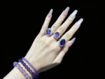 Amethyst ring placed on meditation mat or bedside, for mindfulness and soothing relaxation