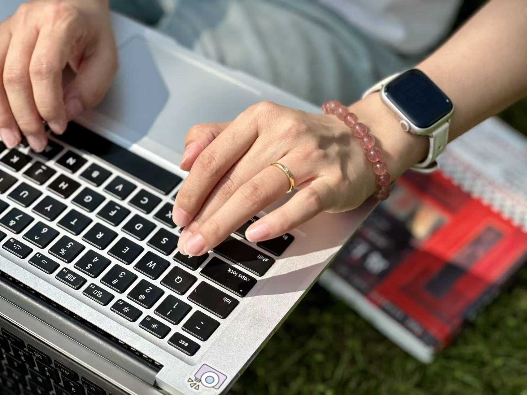 Natural Strawberry Quartz Bracelet - Metal Element Energy for Career & Benefactors Strawberry Quartz bracelet flat lay, pink crystals infused with golden energy, Metal element for attracting benefactors.